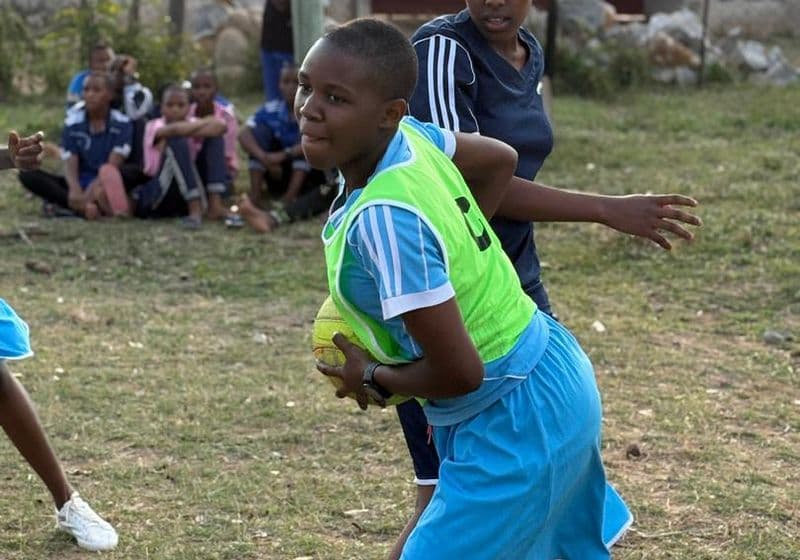 Girls playing handball and netball at Bidii Schools