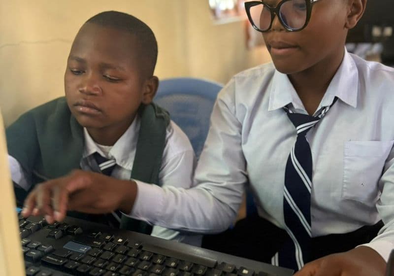 Students in the computer studies room working at a desktop computer at Bidii Schools