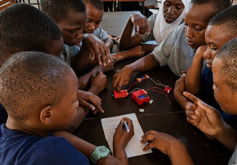 Students exploring a hands-on circuit kit during science at Bidii Schools